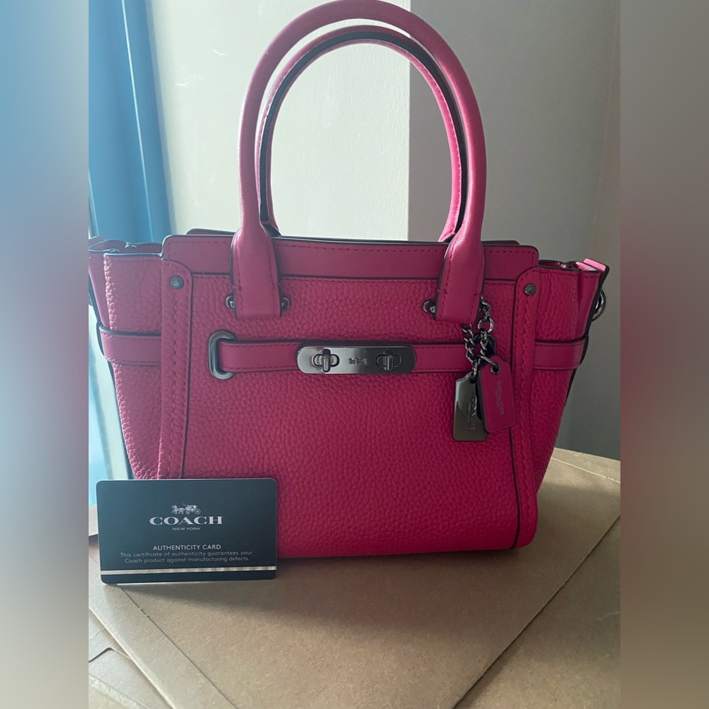 Pink coach purse never been used
